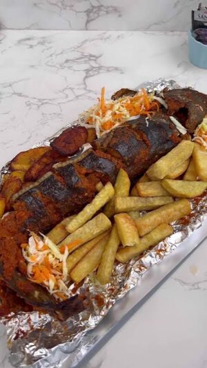 Big Grilled Catfish with Fried Chips, Plantain & Salad