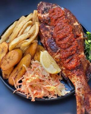 Big Tilapia with Fried Chips, Plantain & Salad