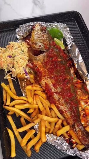 Grilled Crocker with Fried Chips, Plantain & Salad